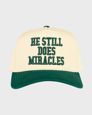 HE STILL DOES MIRACLES TRUCKER HAT - DK GREEN